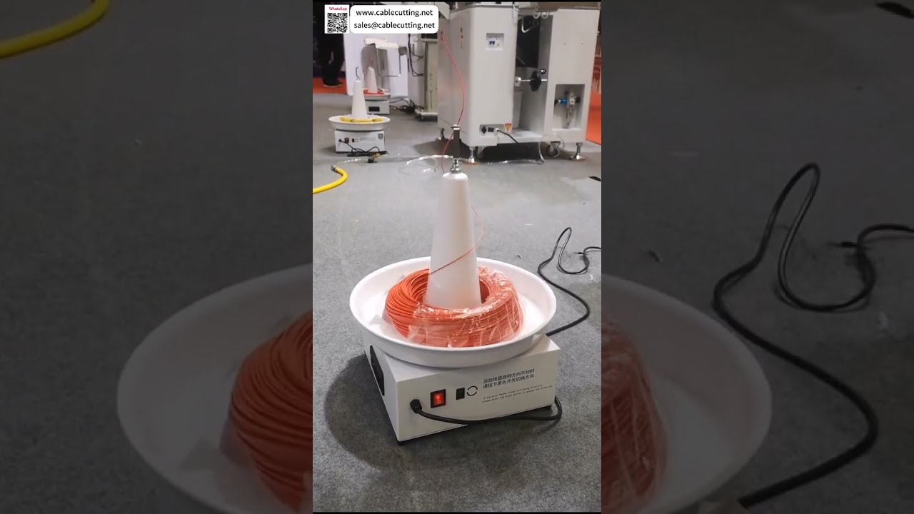Prealimentador Adaptativo y Carrete de Desenrollado para Procesamiento Automático de Arneses de Cables